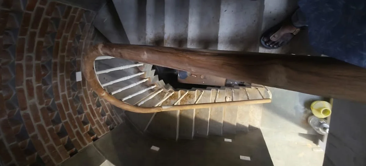 Curved staircase handrail during renovation