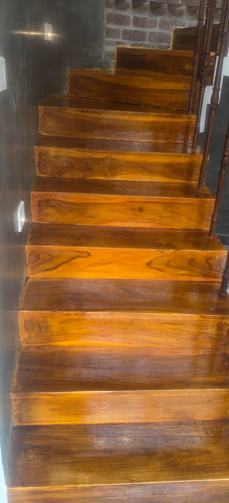 Completed timber stair flight with carefully fitted winding treads